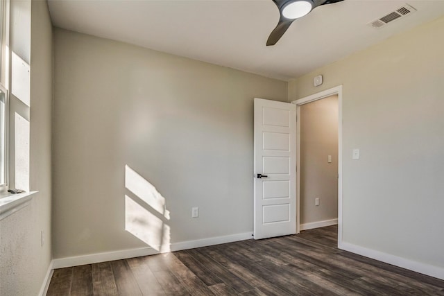 6809 Park Place Dr, Richland Hills, TX 76118 - spare room with plenty of natural light, dark wood-style flooring, ceiling fan, and baseboards
