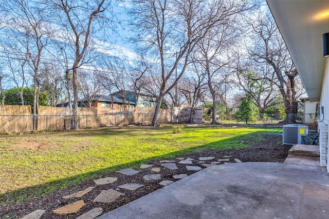 view of yard featuring a patio and central air condition unit