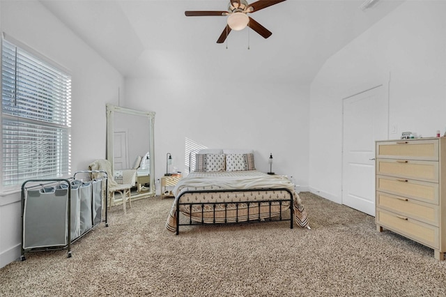 bedroom featuring lofted ceiling, carpet floors, and ceiling fan