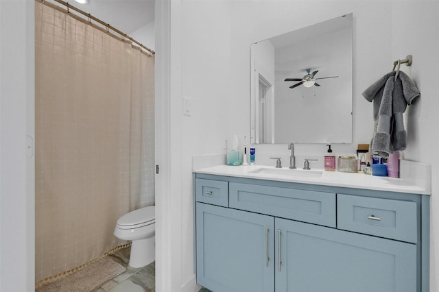 bathroom featuring vanity, ceiling fan, toilet, and a shower with shower curtain