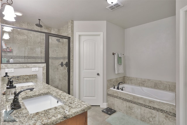 bathroom with tile patterned floors, vanity, and plus walk in shower