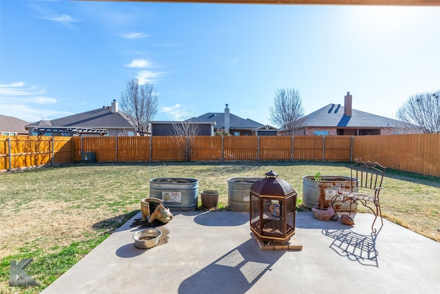 view of patio / terrace with an outdoor fire pit