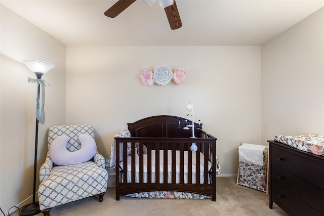 bedroom featuring ceiling fan and light colored carpet