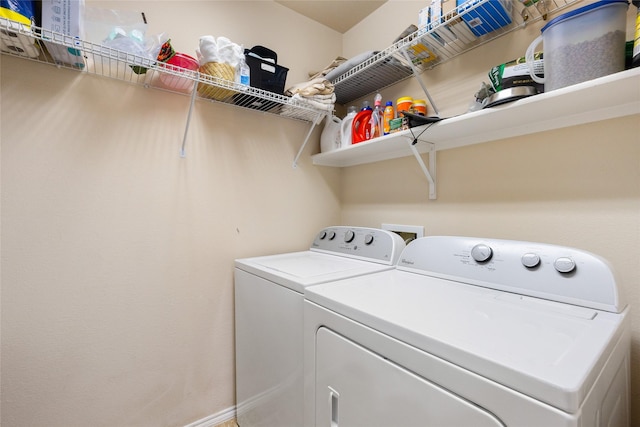 laundry area with washer and clothes dryer