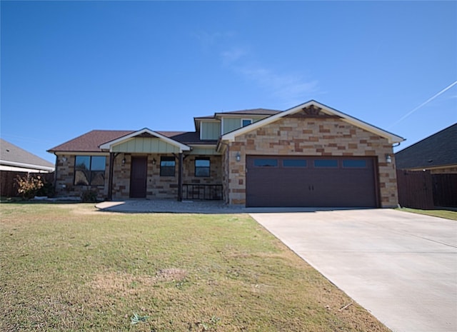 craftsman-style house with a garage and a front yard