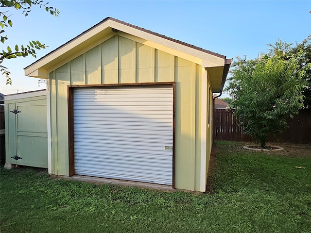 garage featuring a yard