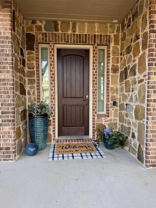 view of front facade featuring a garage and covered porch