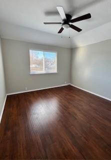 unfurnished room featuring ceiling fan and dark wood-type flooring