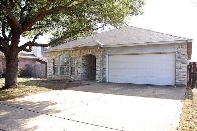 ranch-style home with a garage