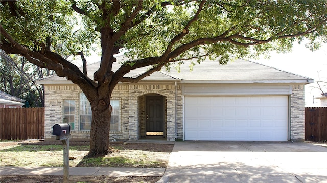 single story home with a garage