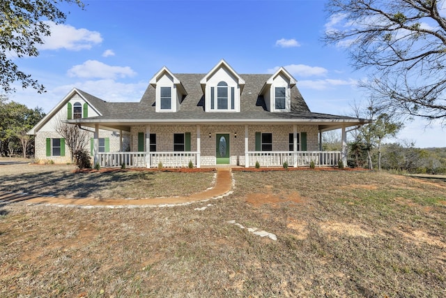 view of front of property featuring covered porch