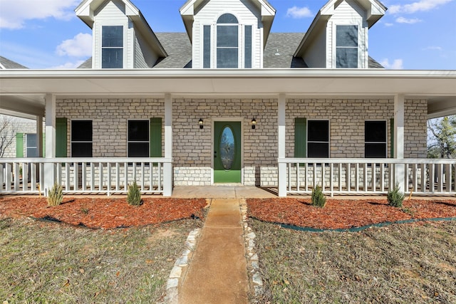 cape cod home with covered porch