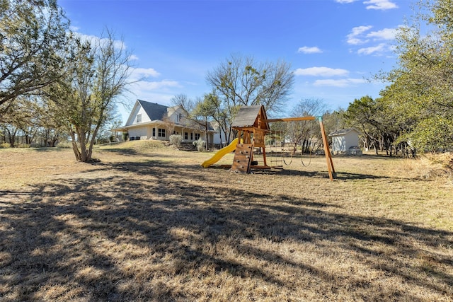 view of jungle gym with a yard