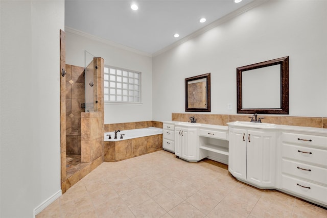 bathroom featuring tile patterned flooring, crown molding, vanity, and shower with separate bathtub