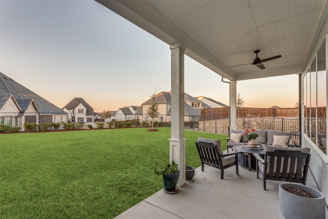 exterior space featuring ceiling fan and an outdoor living space