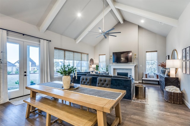 dining area featuring beamed ceiling, ceiling fan, dark hardwood / wood-style flooring, french doors, and high vaulted ceiling