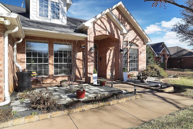 doorway to property featuring a patio area