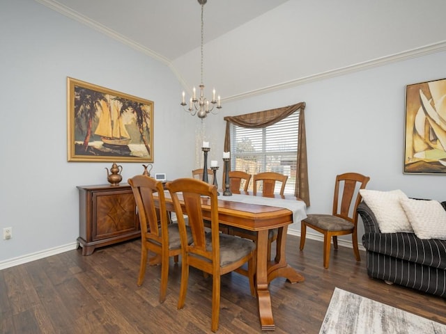 dining room with a chandelier, vaulted ceiling, ornamental molding, and dark wood-type flooring