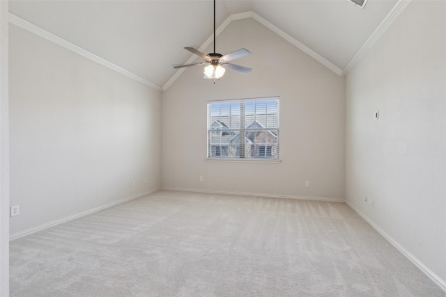 carpeted empty room with ornamental molding, ceiling fan, and vaulted ceiling