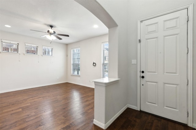 entryway featuring dark hardwood / wood-style flooring and ceiling fan