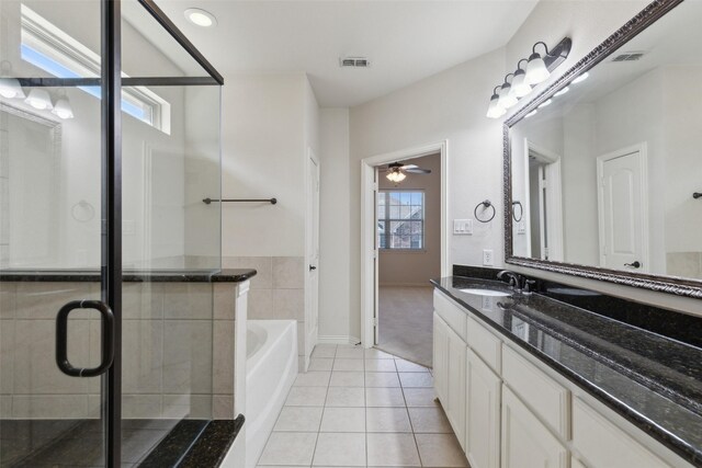 bathroom featuring vanity, tile patterned floors, ceiling fan, and independent shower and bath