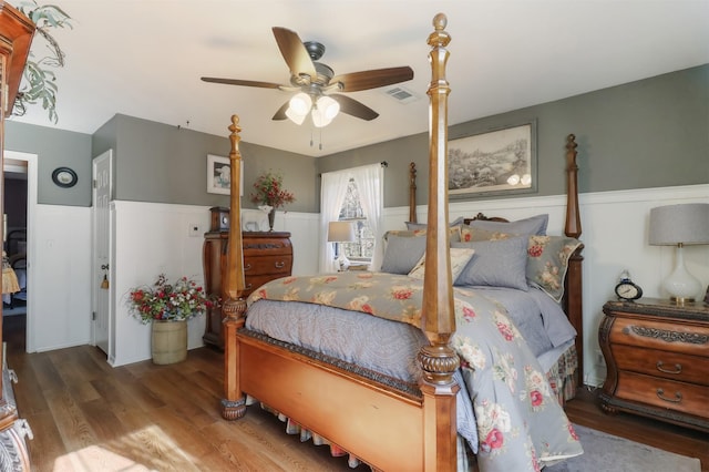 bedroom featuring ceiling fan and hardwood / wood-style floors