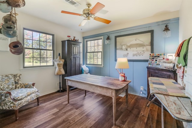 office area featuring wood-type flooring, ceiling fan, and plenty of natural light