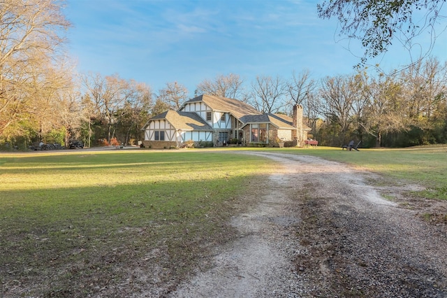 exterior space featuring a front lawn