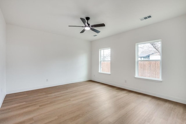 unfurnished room with light hardwood / wood-style floors and ceiling fan