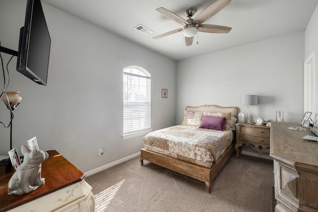 bedroom with ceiling fan, carpet, and lofted ceiling