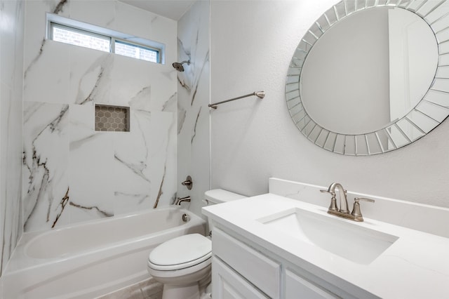 full bathroom with toilet, tiled shower / bath combo, and vanity