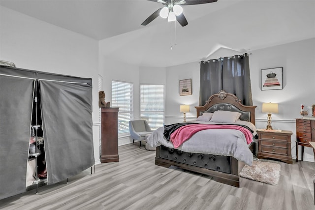 bedroom featuring ceiling fan and light hardwood / wood-style flooring