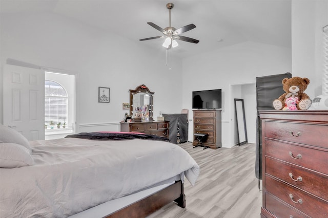 bedroom with lofted ceiling and ceiling fan