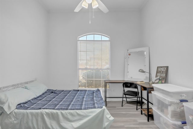 bedroom featuring ceiling fan and light hardwood / wood-style floors