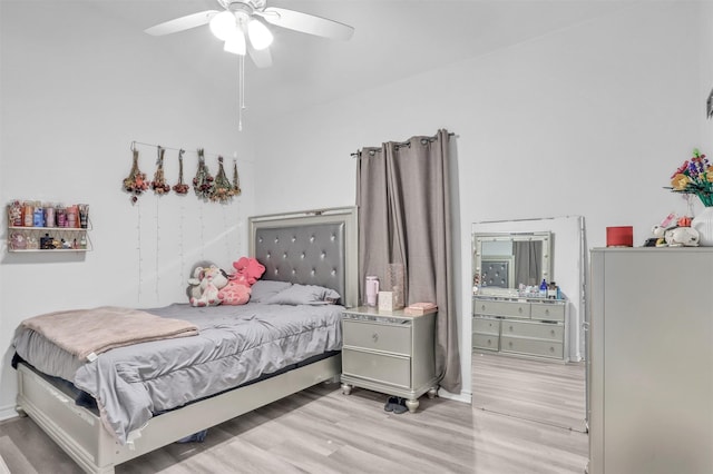 bedroom featuring ceiling fan and light hardwood / wood-style flooring