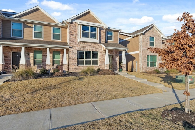 craftsman house with a front yard