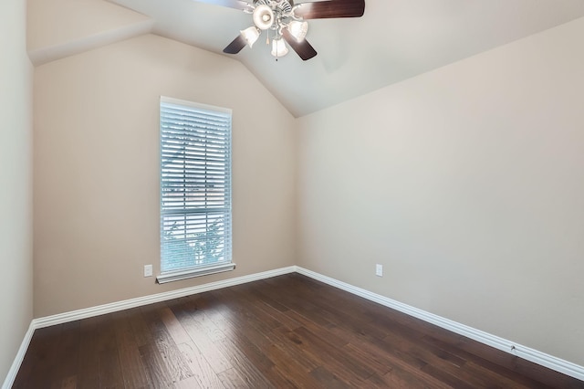 unfurnished room featuring ceiling fan, dark wood-type flooring, and vaulted ceiling