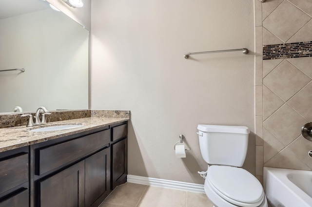 full bathroom featuring toilet, tiled shower / bath, tile patterned floors, and vanity