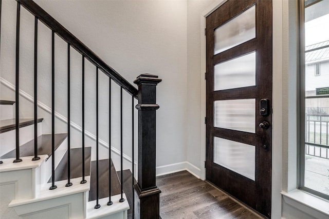 foyer featuring dark hardwood / wood-style floors