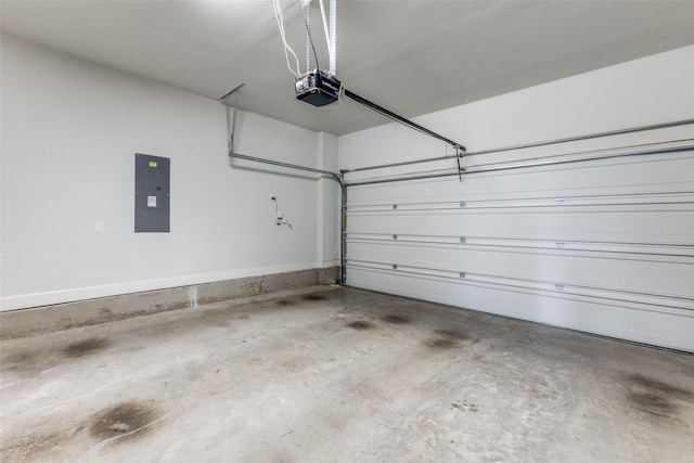 garage featuring a garage door opener and electric panel