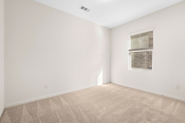 unfurnished room with carpet