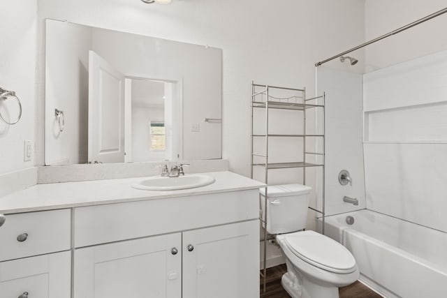 full bathroom with shower / bathing tub combination, vanity, toilet, and hardwood / wood-style flooring