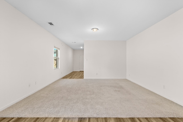 empty room with light wood-type flooring