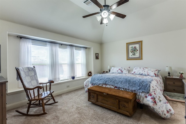 carpeted bedroom featuring vaulted ceiling and ceiling fan