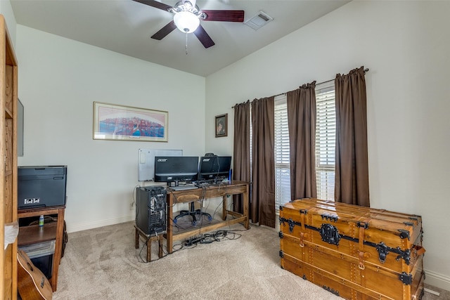 office area featuring ceiling fan and light colored carpet