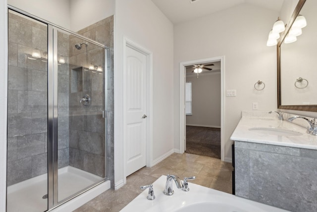 bathroom with ceiling fan, tile patterned floors, vanity, and plus walk in shower