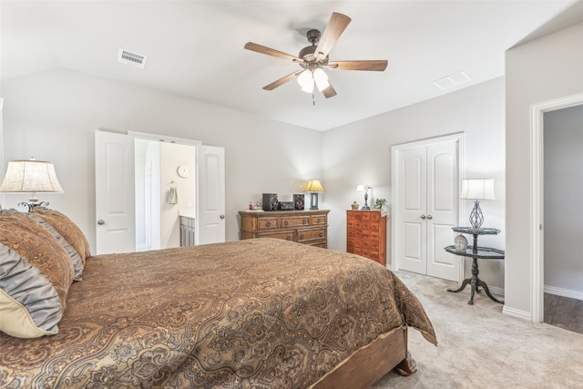 carpeted bedroom featuring ceiling fan, a closet, and connected bathroom