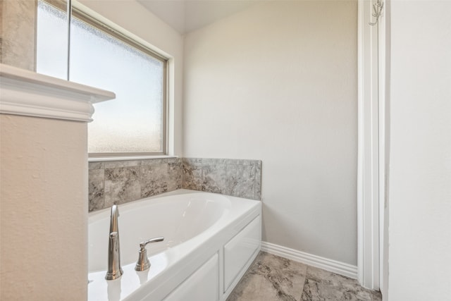 bathroom featuring a washtub