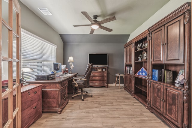 office area featuring vaulted ceiling, ceiling fan, and light hardwood / wood-style floors