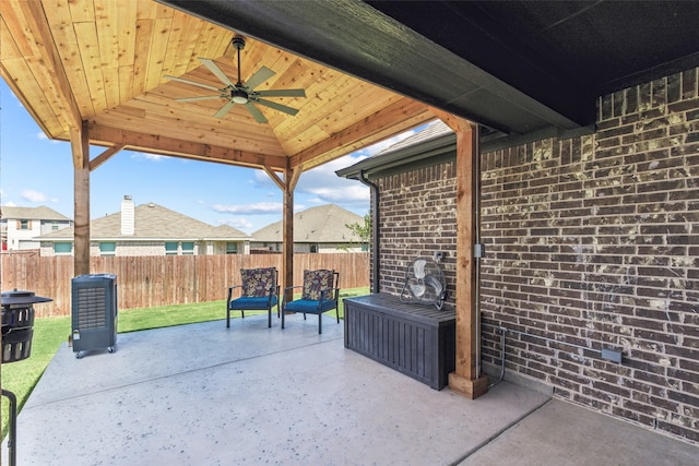 view of patio featuring ceiling fan